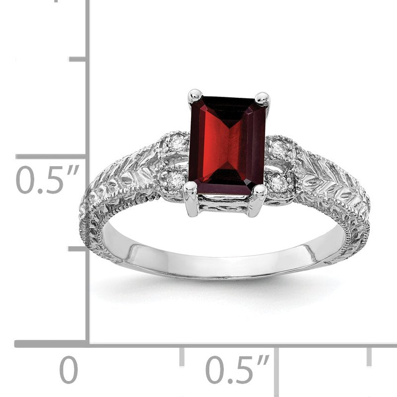 14k White Gold 7x5mm Emerald Cut Garnet A Diamond ring