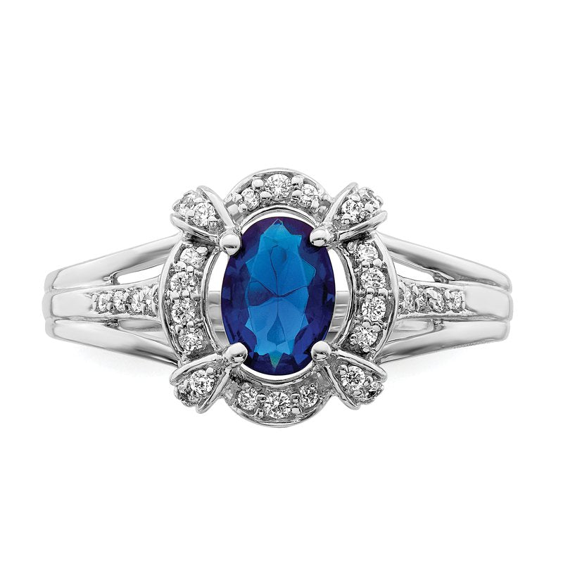 14k White Gold Diamond and Oval Emerald Ring